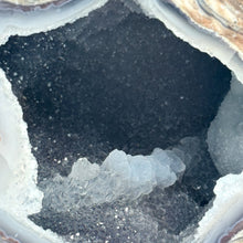 Load image into Gallery viewer, Close-up view of a beautiful crystal cavity inside a Dugway Geode