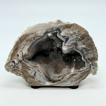 Load image into Gallery viewer, Geode with agate and quartz inside on a white background