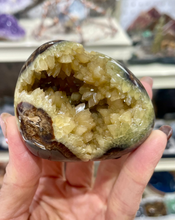 Load image into Gallery viewer, Septarian shaped and polished with crystal interior cavity