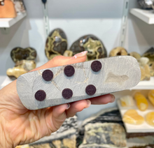 Load image into Gallery viewer, Felt tabs on underside of polished septarian rock free form.