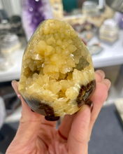 Load image into Gallery viewer, Septarian shaped and polished with crystal interior cavity