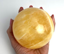 Load image into Gallery viewer, Honeycomb Calcite from Utah carved and polished into a stunning sphere with bright colors and unique pattern