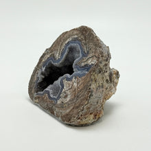 Load image into Gallery viewer, Cut and Polished Dugway Geode with a deep hollow cavity filled with quartz crystals.