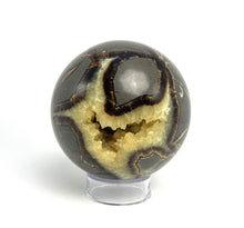 Load image into Gallery viewer, Utah septarian geode sculpted into a unique, one-of-a-kind stunning sphere.