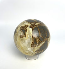 Load image into Gallery viewer, Utah septarian geode sculpted into a unique, one-of-a-kind stunning sphere.
