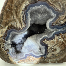 Load image into Gallery viewer, Close-up of a Utah dugway geode with crystal formations on a white background