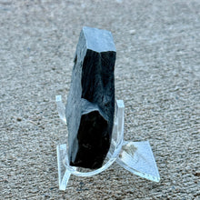 Load image into Gallery viewer, Wheeler shale on a clear stand against a concrete background