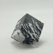Load image into Gallery viewer, Zebra Marble cut and polished into a zebra patterned cube on a white background