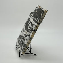 Load image into Gallery viewer, Decorative Zebra marble stone slab on a stand against a white background