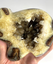 Load image into Gallery viewer, Septarian geode carved and polished with beautiful smoky calcite crystals