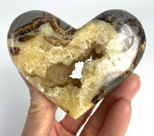 Load image into Gallery viewer, Utah Septarian Geode Heart sculpted and polished from a Septarian geode with a stunning calcite crystal hollow 
