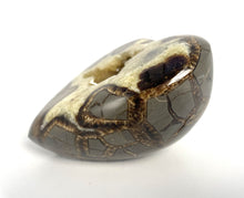 Load image into Gallery viewer, 3D Septarian Heart made from a Utah Septarian Geode with a unique barite crystal nestled amongst calcite crystals