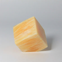 Load image into Gallery viewer, Cube of Calcite standing on it's corner cut base