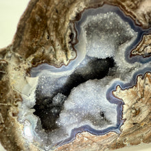 Load image into Gallery viewer, Close-up of a Utah Dugway geode with crystal formations inside
