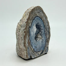 Load image into Gallery viewer, Dugway Geode with blue interior on a white background
