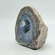 Load image into Gallery viewer, Dugway Geode with blue crystal interior on a white background
