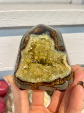 Load image into Gallery viewer, Septarian shaped and polished with crystal interior cavity
