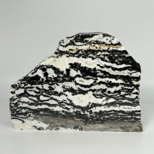 Load image into Gallery viewer, Black and white Zebra marble stone slab on a gray background
