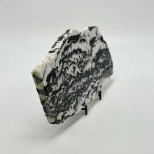 Load image into Gallery viewer, Zebra marble slab with black and white striped pattern on a white background
