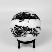 Load image into Gallery viewer, Zebra marble sphere on a stand against a white background
