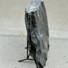 Load image into Gallery viewer, Side view of shale rock on black metal stand
