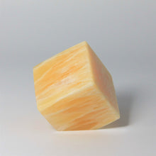 Load image into Gallery viewer, Cube of Calcite standing on it&#39;s corner cut base
